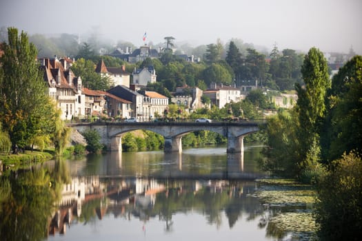 Picturesque view of Perigord town in France. Landscape with the river Vezere.