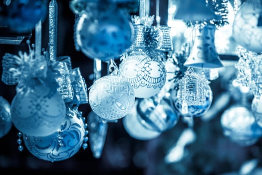 Christmas decoration on an european market. Holiday shopping