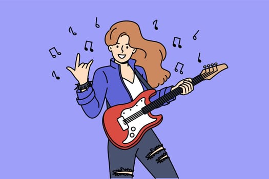 Woman rock star plays electric guitar and demonstrates cool gesture, standing among notes. Girl participating in rock concert performs on stage for audience, performing song from new album