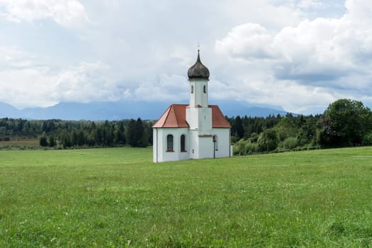 Chapel of Saint John in a mountain landscape in Penzberg, Bavaria, Germany