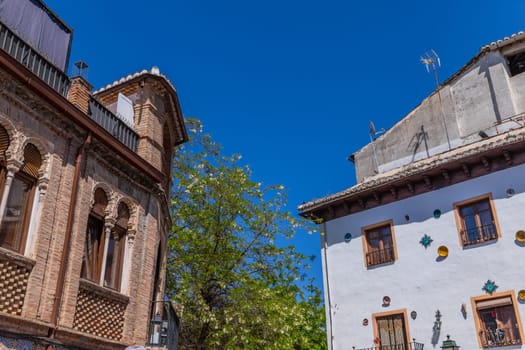 Granada, Spain: April 15, 2024: The decored houses in Albaicin district. Andalusia, Spain