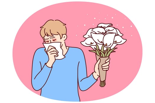 Allergic man holding bouquet flowers and using handkerchief suffering from pollen in need of allergy medicine. Everyday guy allergic with lilies wanting to make romantic gift suffers from runny nose