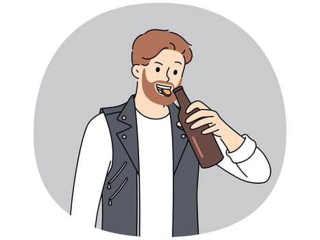 Brutal man opens bottle of beer with teeth and smiles, suffering from alcohol addiction. Young bearded guy in leather vest drinks beer enjoying taste of refreshing intoxicating drink