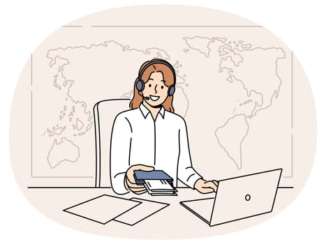 Woman manager of travel agency sits at office desk and holds passport with visas and plane tickets. Tour operator company representative in headphones near giant map of world helps to travel