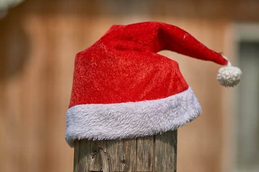 santa Claus hat is put on a pole. High quality photo