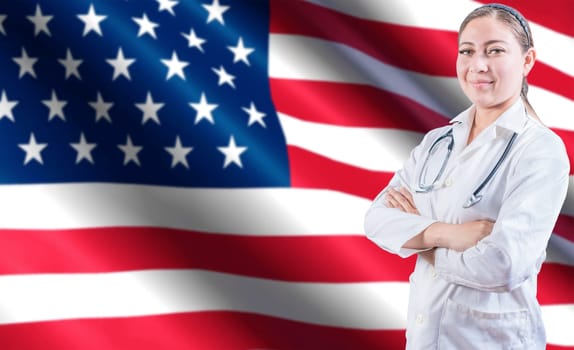 Portrait of female doctor with crossed arms with USA flag in the background. Health and care with flag of United State