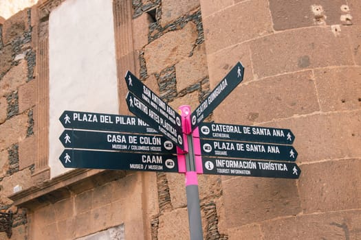 Gran Canaria, Spain, Canary Islands, Las Palmas - Jul 22, 2024. Signpost in the historic district of Las Palmas with names of sights specify the direction to them.