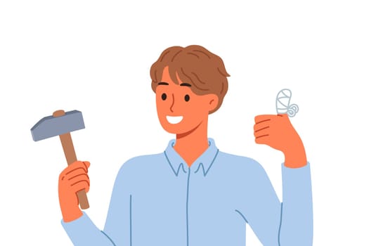 Man injured finger using hammer to drive nail, shows thumbs up and reports that everything is OK. Young guy has finger injury with bandages applied to stop bleeding and avoid infection