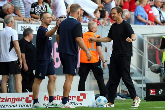 Head coach Julian Schuster (SC Freiburg) enjoys the moment and celebrates the 3-1 victory in the match of the 1st FBL: 24-25: 1. Sptg. SC Freiburg - VfB Stuttgart  DFL REGULATIONS PROHIBIT ANY USE OF PHOTOGRAPHS AS IMAGE SEQUENCES AND/OR QUASI-VIDEONann  Photo: Joachim Hahne/johapress