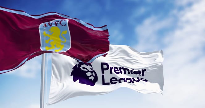 Birmingham, UK, Aug. 21 2024: Aston Villa and Premier League flags waving on a clear day. Fluttering fabric. Illustrative editorial 3d illustration render. Waving flag