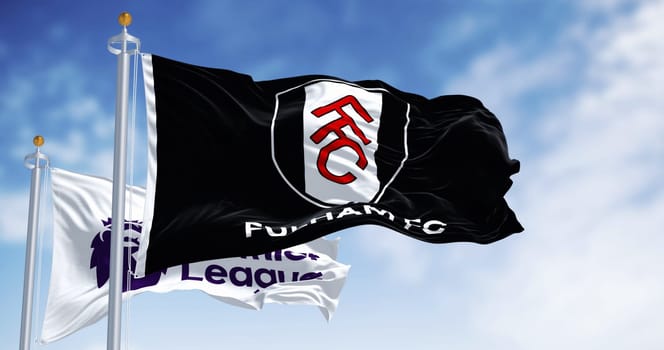 London, UK, Aug 5 2024: Fulham Football Club and Premier League flags waving. Professional Football club based in London. English Premier League. Illustrative editorial 3d illustration render