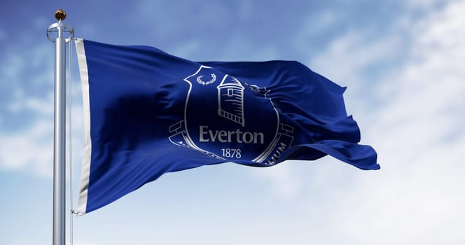 Liverpool, UK, Aug. 21 2024: Everton Football Club flag waving on a clear day. Professional english football club. Illustrative editorial 3d illustration render. English Premier League