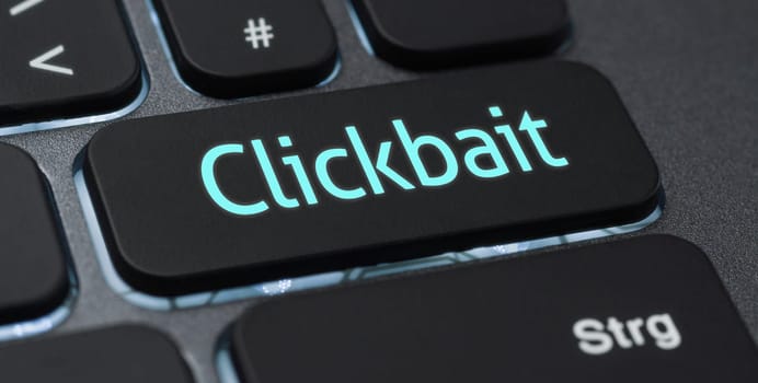 Illuminated keyboard with a labeled key - Clickbait