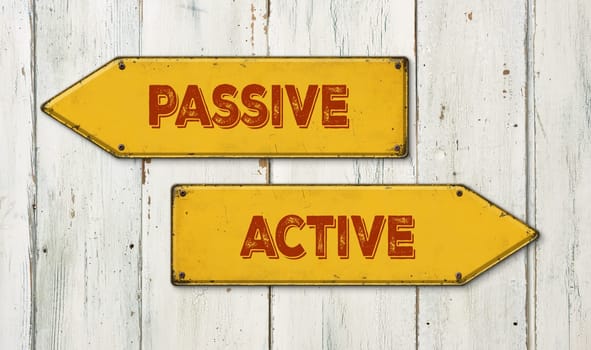 Direction signs on a wooden wall - Passive or Active