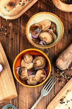Salted mushrooms in a plate. Homemade pickled mushrooms