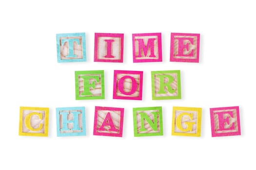 A time for change concept with childs wood blocks on white with clipping path to remove shadow