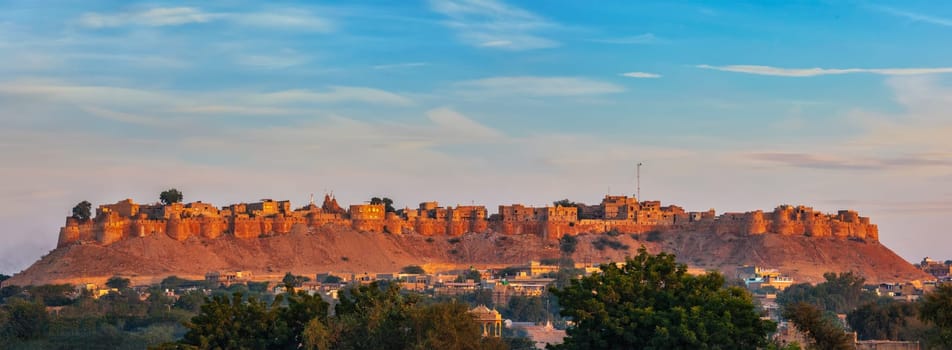 Panorama of Jaisalmer Fort - one of the largest forts in the world, known as the Golden Fort Sonar quila on sunrise. Jaisalmer, Rajasthan, India