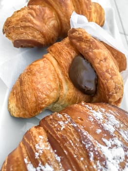 Delicious fresh croissants with chocolate