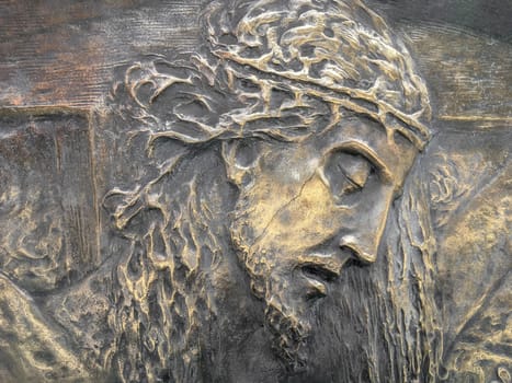 Close-up bas-relief of the dead Christ