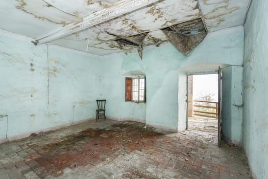 Old house to renovate. Creepy room scenery. Cracked walls and vintage italian floors along with a decay atmosphere.