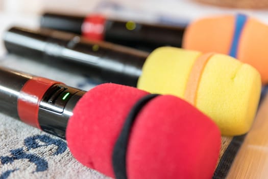 Colorfull karaoke microphones ready for party. Closeup.