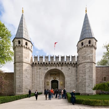 Istanbul, Turkey - May 11, 2023: Topkapi Palace: The large Gate of Salutation, aka the Middle Gate, or Orta Kapi, leads to the Second Courtyard of the palace