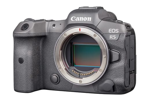 Canon R5 - black professional 35mm full-frame mirrorless camera body with flip screen isolated on white background with focus stacking - Tula, Russia, September 15, 2021
