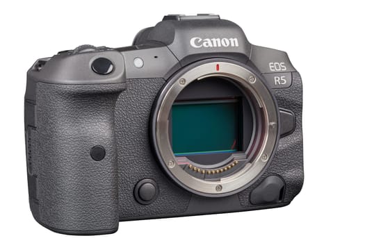 Canon R5 - black professional 35mm full-frame mirrorless camera body with flip screen isolated on white background with focus stacking - Tula, Russia, September 15, 2021