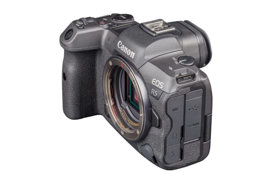 Canon R5 - black professional 35mm full-frame mirrorless camera body with flip screen isolated on white background with focus stacking - Tula, Russia, September 15, 2021