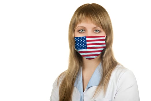 Closeup of a female healthcare professional nurse wearing a protection mask with USA flag