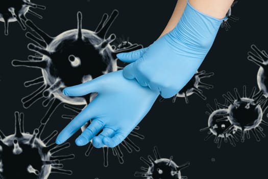 Hand in protective gloves on corona virus COVID-2019 background.
