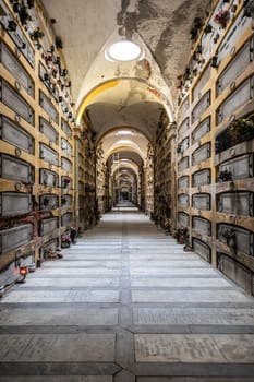 Genoa, Italy - 17 August 2024: corridor in Staglieno ancient cemetery