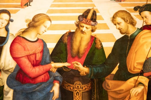 Milan, Italy - 23 September 2023: Brera antique painting museum. Marriage of the Virgin, by Raffaello Sanzio - Raphael, 1504