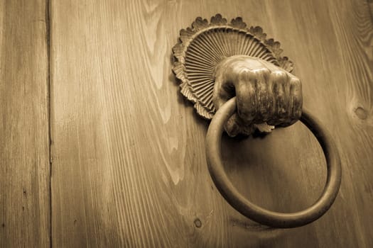 Mysterious old door entrance. Dark light. Abstract concept of secret, horror and magic.
