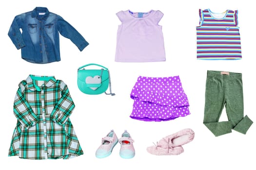 Collage set of little girl summer clothes isolated on white. Kids apparel collection. Childs fashion clothing outfit. Skirt, shorts, shirt, dresses, jeans, bag, sweater, shoes.