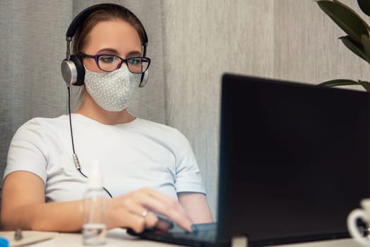 Coronavirus concept. Woman in quarantine for coronavirus working from home