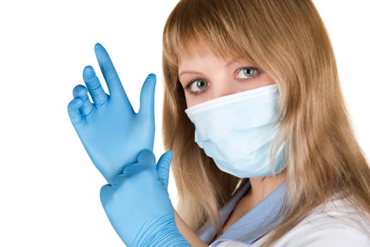 Closeup of a doctor wearing a protection mask and gloves on white