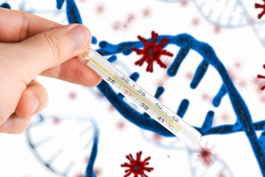 Hand with a medical thermometer on COVID-19 background.