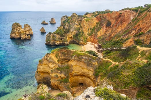 Landscape photography overlooking Praia do Camilo near Lagos, famous beach in the Algarve, Portugal