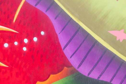 Abstract detail of color graffiti painted on the wall
