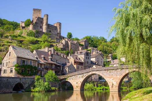 Belcastel village, castle and medieval bridge over Aveyron river, one of the most beautiful villages of France photographed in Occitanie region