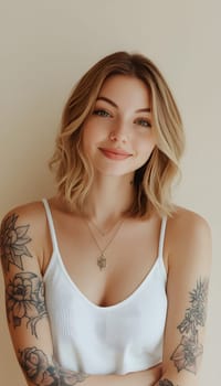 attractive woman with shoulder length blonde hair and tattoos