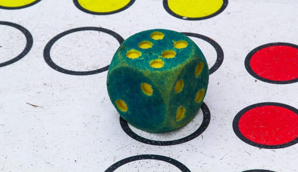 A dice shows the six.