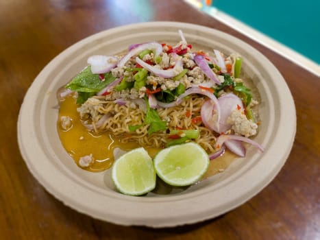 Instant noodles spicy salad with mined pork, stock photo