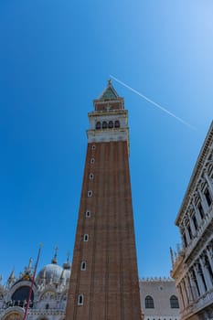Close up of the San Marco Campanile. St Mark's bell tower located on the Piazza San Marco in Venice, Italy.
