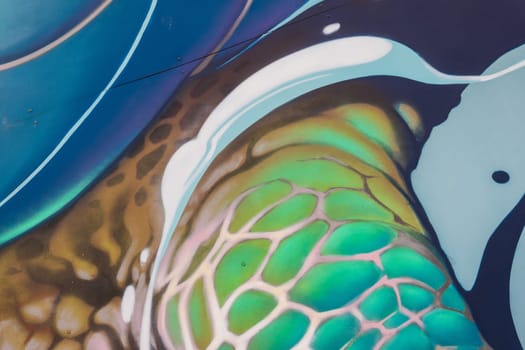 Abstract detail of color graffiti painted on the wall