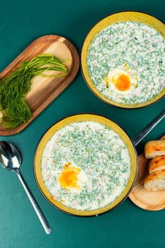Traditional summer cold soup okroshka in a plate. Okroshka - Ukrainian cold summer soup