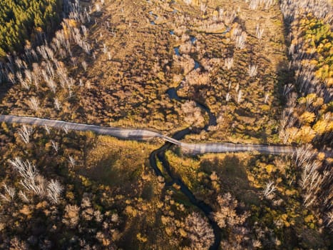 Aerial drone view of autumn landscape with river.