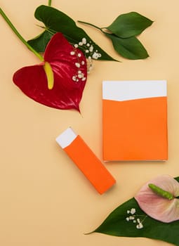 Makeup cosmetic products on vivid color background, flat lay top view.