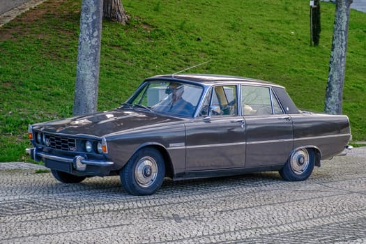 Lisbon, Portugal - Jan 20, 2024: A classic brown Rover P6 Series II or Mark II 2000 TC executive car, 4 door saloon, parked on a cobblestone path in a city.